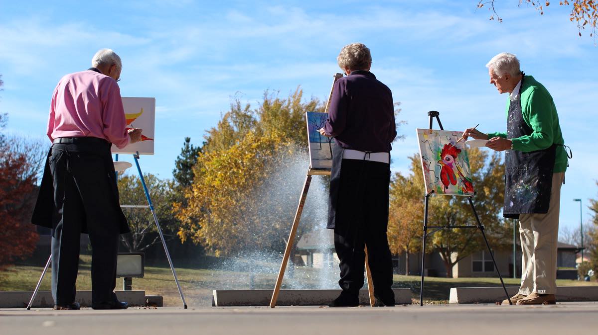ER Senior Management | Residents painting outdoors
